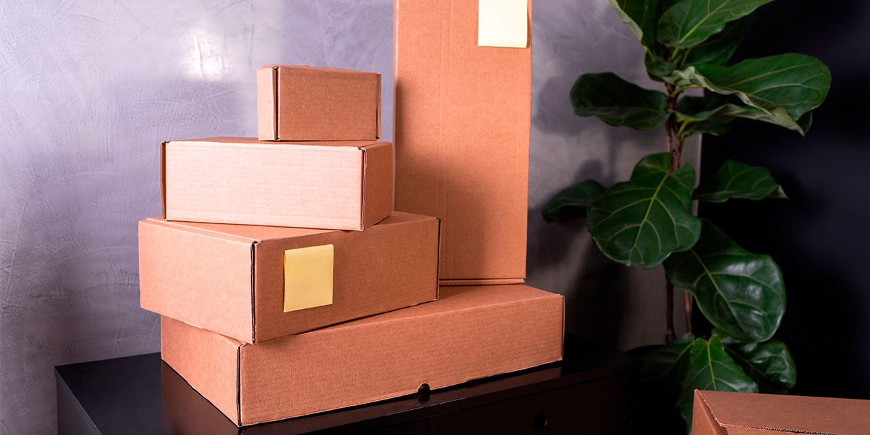 como a embalagem ajuda a proteger o produto como caixas de papelão